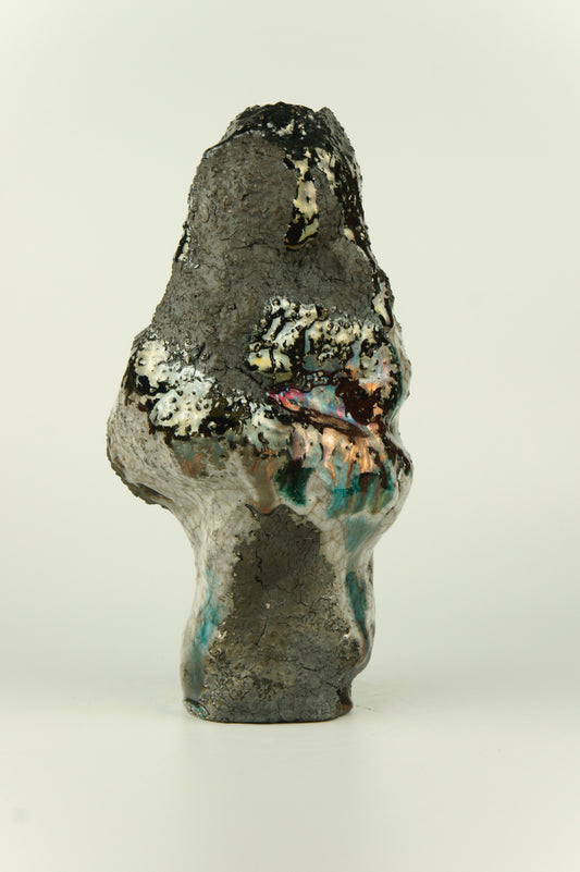 Ceramic art object. Raw texture and raku