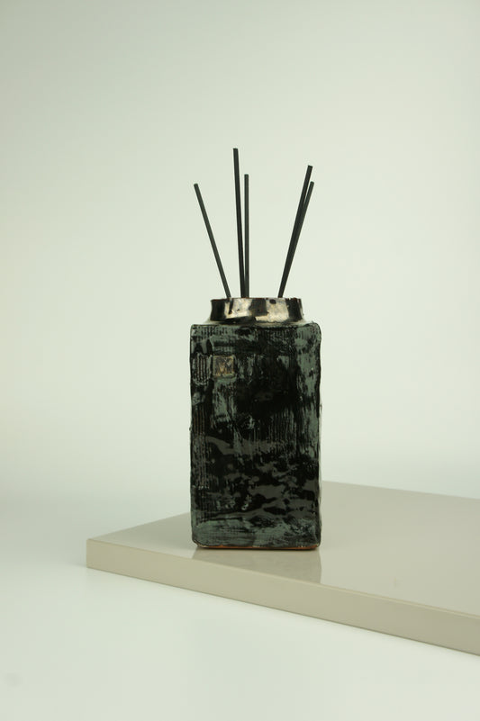 Ceramic diffuser for home fragrances in wabi-sabi design