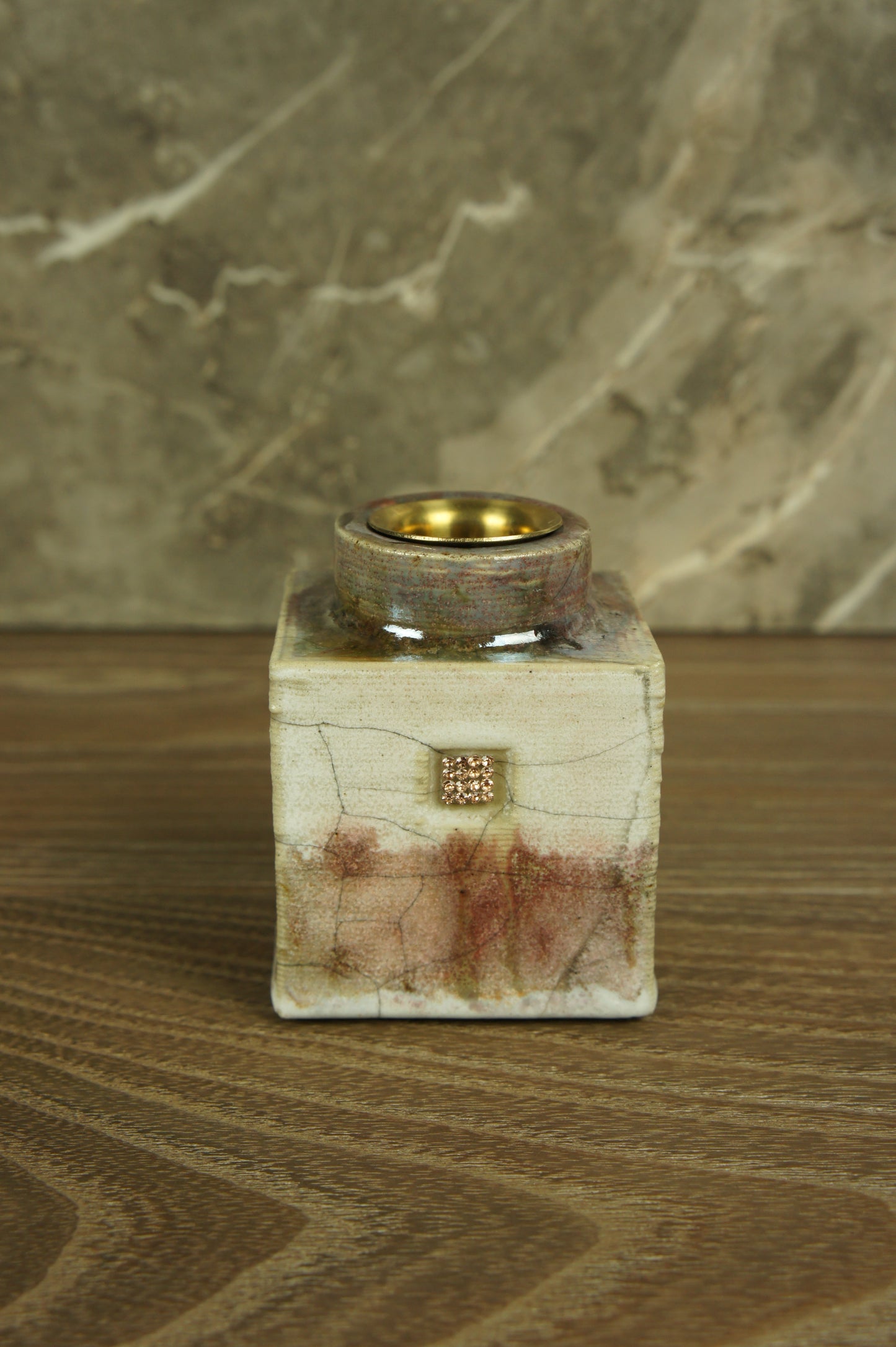 Ceramic reed diffuser on beige and brown color with stylish inserts