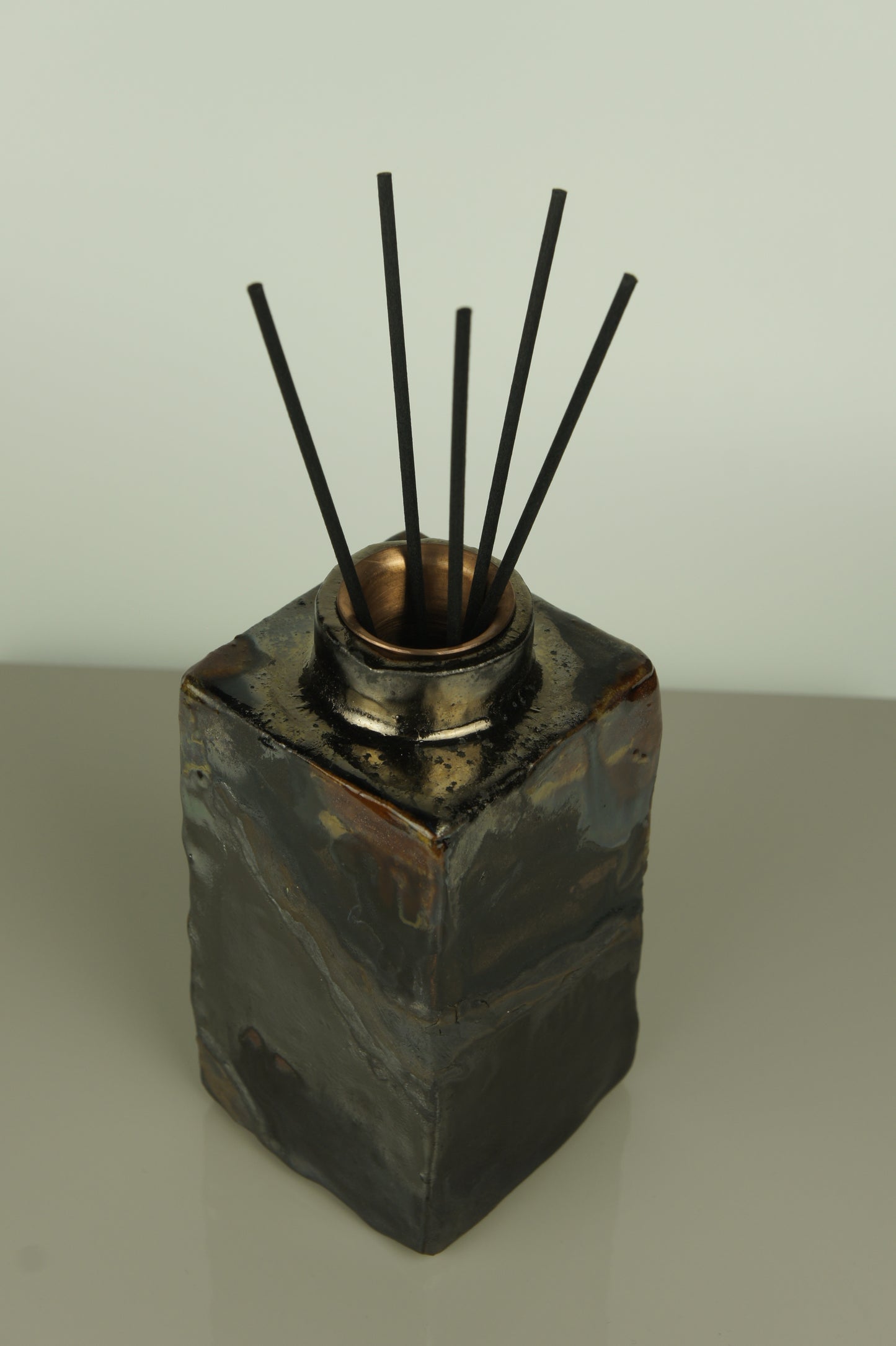 Ceramic diffuser for home fragrances in wabi-sabi design