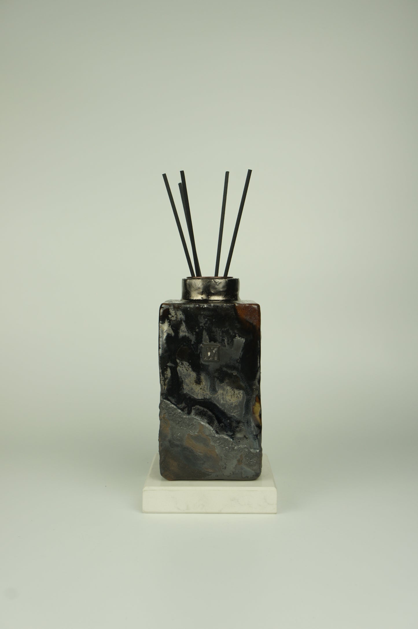 Ceramic diffuser for home fragrances in wabi-sabi design