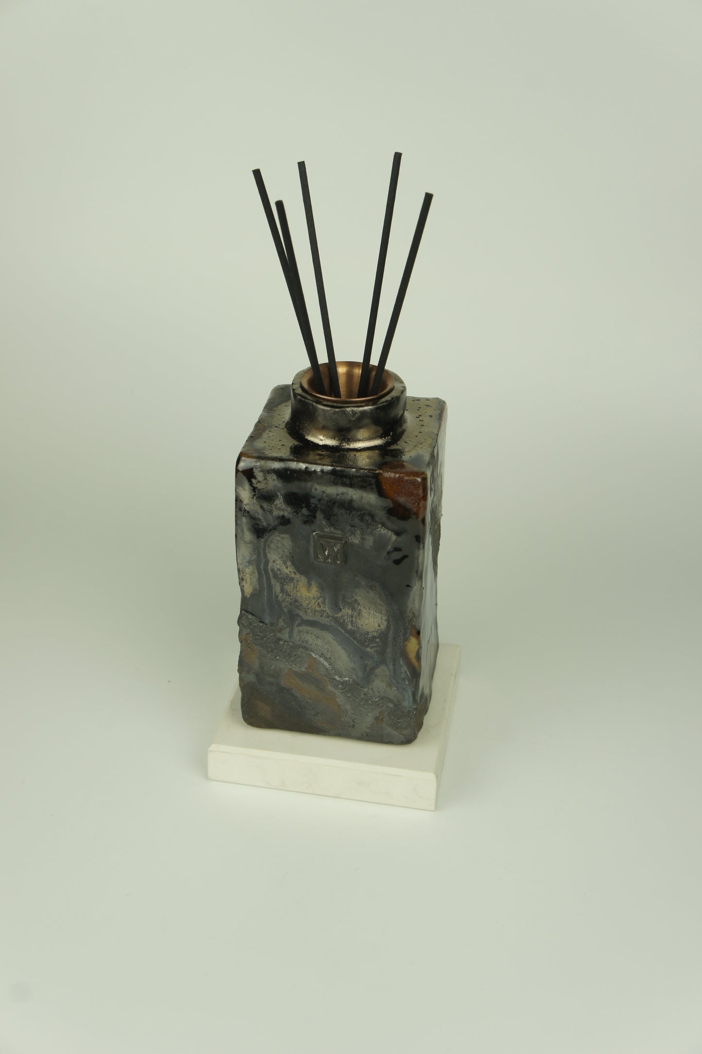 Ceramic diffuser for home fragrances in wabi-sabi design